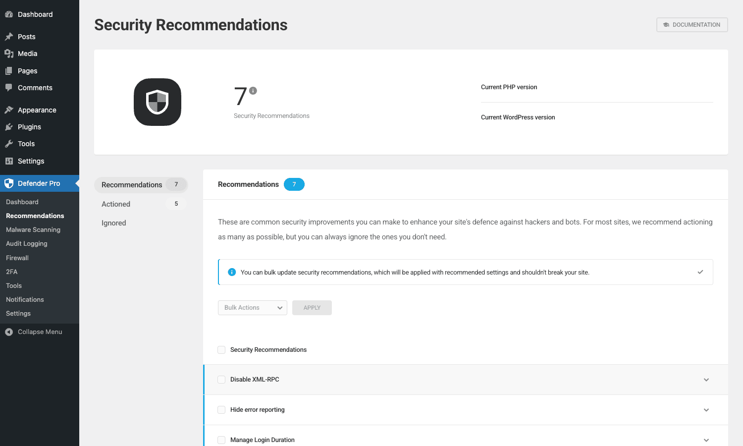 Defender Security Recommendations admin page showing 7 to action, 5 actioned, Bulk Actions, and individual recommendations like Disable XML-RPC, Hide error reporting Defender Pro Security Recommendations page with 7 active recommendations and 5 actioned