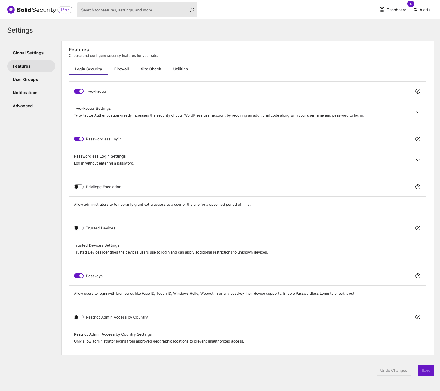Solid Security Pro Login Security features Solid Security Pro Login Security features with toggles for Two-Factor, Passwordless Login, Privilege Escalation, Trusted Devices, Passkeys, and Restrict Admin Access by Country
