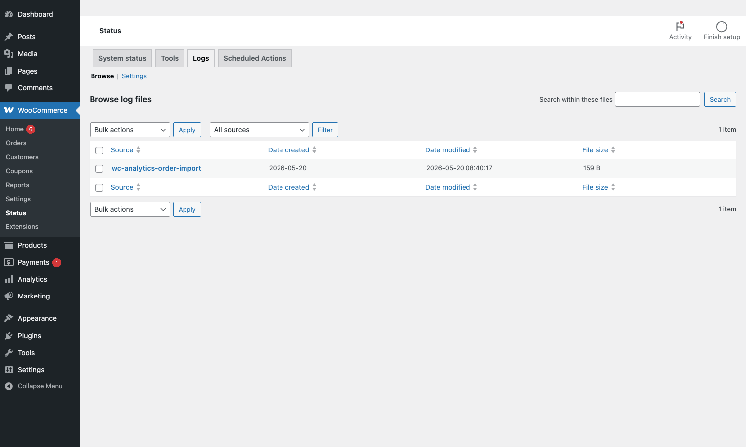 WooCommerce Status Logs panel showing log files WooCommerce Status Logs panel